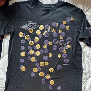 Jordan Black Tee with Purple and Gold Accents